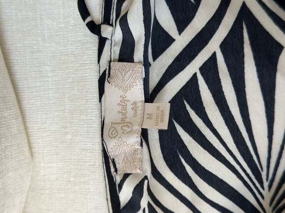 Indulge in Style Black and White Leaf Print Smocked Maxi Dress - Picture 7 of 7